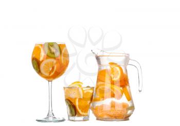 collage pitcher with a refreshing drink with lemon slices of orange and kiwi on white background