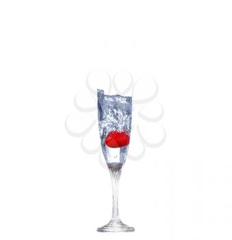 Strawberry splash in a cocktail glass on white