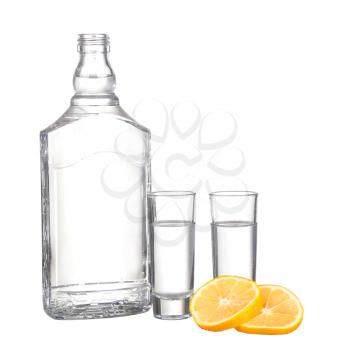 blank label vodka glass and lemon on white background