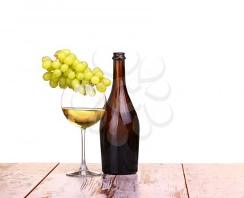 glass of wine, a glass of wine and grapes on board isolated on white background