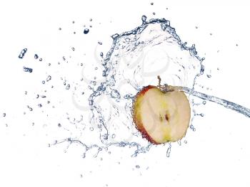 Apple in spray of water. Juicy apple with splash on white background