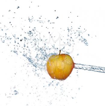 Apple in spray of water. Juicy apple with splash on white background