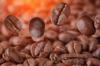 Closeup of flying coffee beans 