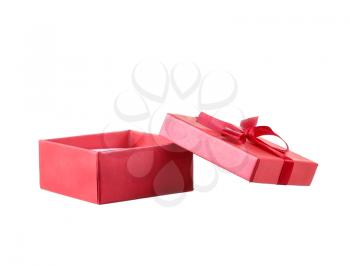 Red gift box with white ribbon isolated on red background. Clipping path included.