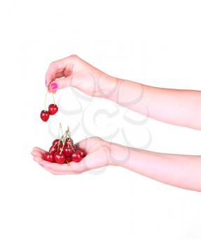 collage Cherries in a female hand on a white
