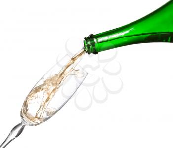 Champagne being poured into glass or flute, isolated on a white background.
