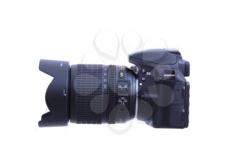 KYIV, UKRAINE - JULE 10, 2015: Nikon d3300 camera with nikkor 18-105mm lens on white background