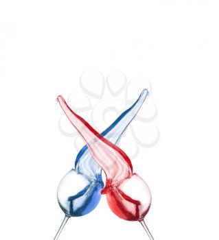 collage of red and blue cocktail splashing from glass isolated on white background