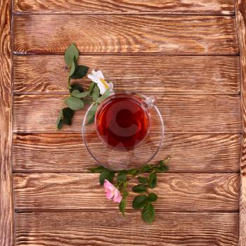 Herbal tea with herb on old wooden table. Top view. alternative medicine concept