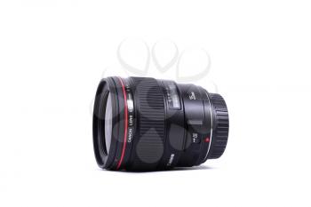 KYIV, UKRAINE - FEBRUARY 28, 2016:  Canon 35mm f/1.4 L EF USM Lens. Canon Inc. is a Japanese multinational corporation specialized in the manufacture of imaging and optical products.