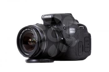 KIEV, UKRAINE, APRIL 25, 2016:  Canon EOS 700D Kit 18-55 IS DSLR black. Canon is the world largest SLR camera manufacturer.