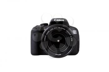KIEV, UKRAINE, APRIL 25, 2016:  Canon EOS 700D Kit 18-135 IS STM DSLR black. Canon is the world largest SLR camera manufacturer.