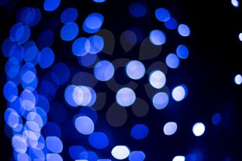 bokeh lights on black background, shot of Christmas lights festive garland