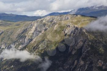 Montenegro, national park Durmitor, mountains and clouds. National mountains park Durmitor in Montenegro - nature travel background