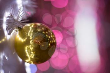 beautiful Christmas toy on outdoor Christmas decorations with beautiful bokeh of garlands
