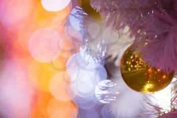 beautiful Christmas toy on outdoor Christmas decorations with beautiful bokeh of garlands