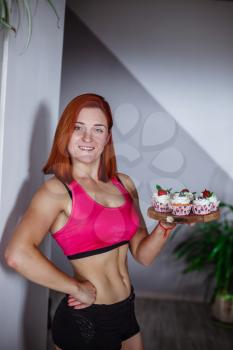Healthy Diet And Nutrition. Portrait of happy beautiful young woman eating natural cake at home and looking at camera.Weight Loss Food Concept. I baked with for you with love.