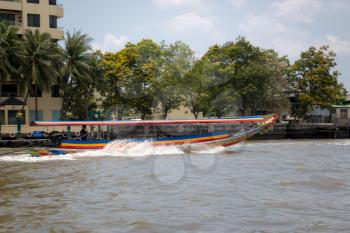 bangkok , thailand 25 march 2017 Long tail boat in Chao Phraya river in Bangkok, Thailand in a summer day.