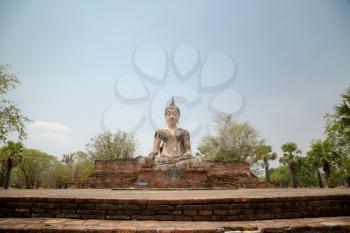 The statue Buddha of Wat Phra si rattana mahathat or Wat Phra Prang in sri Satchanalai historical park, Sukhothai Province, Thailand