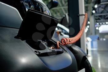 MOSCOW, SEPTEMBER 31, 2018: The newest Renault Twizy electro car on automotive exhibition stand on MMAC 2018. Automobile show of family personal cars.