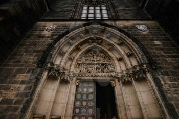 PRAGUE, CZECH REPUBLIC - 11 AUGUST 2019: Door of Church of St. Peter and Paul at Vysehrad castle, Prague, Czech Republic