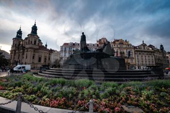 Prague, Czech Republic - 11.08.2019, Jan Hus monument at Old Town Square is the heart of the Czech city of Prague with many churches, old houses, a town hall and Prague chimes