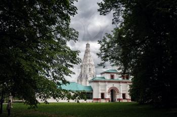 the Kolomenskoye Museum reserve. Church Of The Ascension framed by green branches of the park