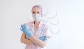 Doctor or nurse hand in blue gloves holding covid-19 vaccine disease preparing for child, baby, adult, man and woman vaccination shot, medicine and drug concept.