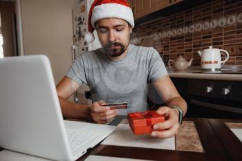 Christmas online shopping, sales and discounts promotions during the Christmas holidays, online shopping at home and lockdown coronavirus. Xmas