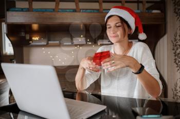 Happy asian woman celebrating friends with video call. Christmas online holiday celebration, Xmas, new year in lockdown coronavirus covid-19 quarantine. New normal, social distance, stay home