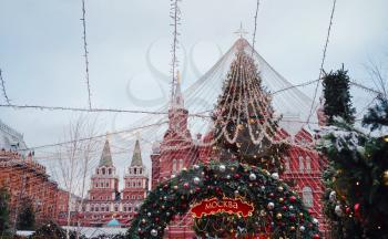 New year. Christmas decorations on the streets of Moscow. Christmas holidays, winter landscape. Christmas market on the festively decorated red square. The inscription on the red plate: Moscow.