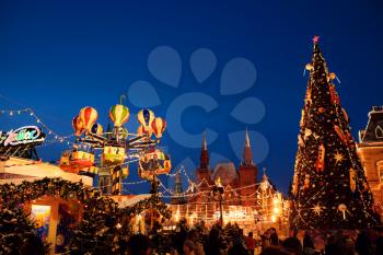 Moscow, Russia, 10 January 2020: Celebration of the New Year and Christmas in the center of Moscow. Holiday fair and amusement park near the Kremlin.
