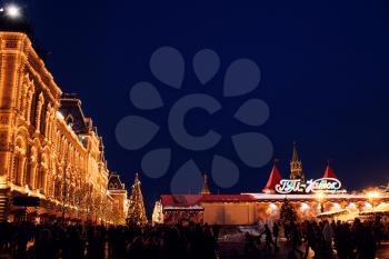 Moscow, Russia, 10 January 2020: Celebration of the New Year and Christmas in the center of Moscow. New Year and Christmas fair on Manezhnaya Square, Holiday fair and amusement park near the Kremlin.