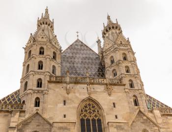 Towers and spires of St Stephens Church or Cathedral in old town Vienna, Austria