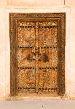 Detail of wooden door at Shaikh Isa bin Ali House in Al Muharraq, Bahrain, Middle East