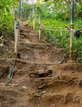 Steep climb with rope handles up hillside away from Hideaways Beach, Hanalei, Kauai, Hawaii