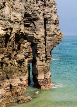 Sea Arch and cliffs jutting into the sea, Cornwall, England, UK