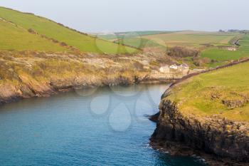 South West Coast Path along hillside above village of Port Quin, Cornwall, England, UK