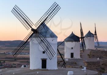 Preserved historic windmills on hilltop above Consuegra in Castilla-La Mancha, Spain