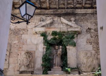 Ancient statue in town of Cuenca in Castilla-La Mancha, Spain, Europe