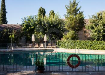 Swimming pool in garden of Parador in Almagro in Castilla-La Mancha, Spain, Europe