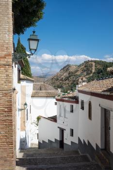 Narrow streets lead off the Mirador San Nicolas in ancient city of Granada in Andalucia, Spain, Europe