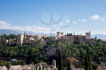 View of Nasrid Palace and church in Alhambra Palace from Mirador San Nicolas in ancient city of Granada in Andalucia, Spain, Europe