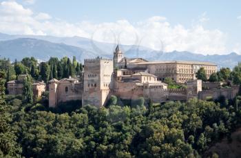 View of Nasrid Palace and church in Alhambra Palace from Mirador San Nicolas in ancient city of Granada in Andalucia, Spain, Europe