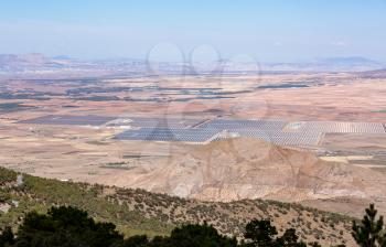 Rows of solar panels  for power generation from the sun in remote locations in Southern Spain
