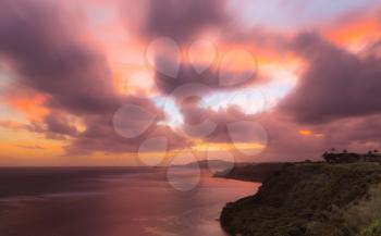 Dawn sunrise along coast with Sealodge and anini beach to Kilauea lighthouse in Kauai Hawaii