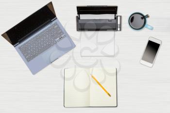 Tidy organized desk top with laptop, scanner and electronics with cup of coffee or tea on white wooden table for designer workspace