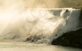 American waterfall at sunrise taken from Canadian side of Niagara Falls