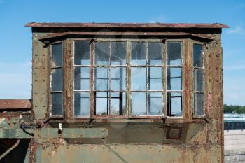 Rusting metal cabin of old locomotive used to dredge river at power station by Niagara Falls