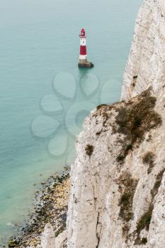 Red and white striped lighthouse off Beachy Head near Eastbourne, East Sussex